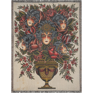 Laurent Trelaun's Familiar Vase Blanket showcasing detailed floral and skull design.