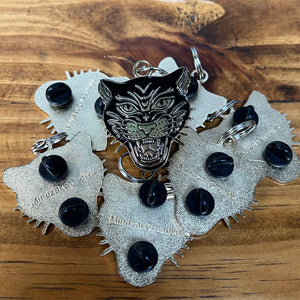 Side view of Panther Pull Pin highlighting double-post closure and rubber back.