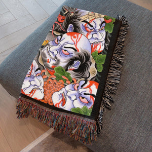 Folded Alex Rusty blanket showing detailed pattern and rich texture