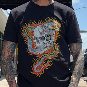 Close-up of Keeper Shirt by Skor Tattooer showcasing intricate linework and vibrant colors.