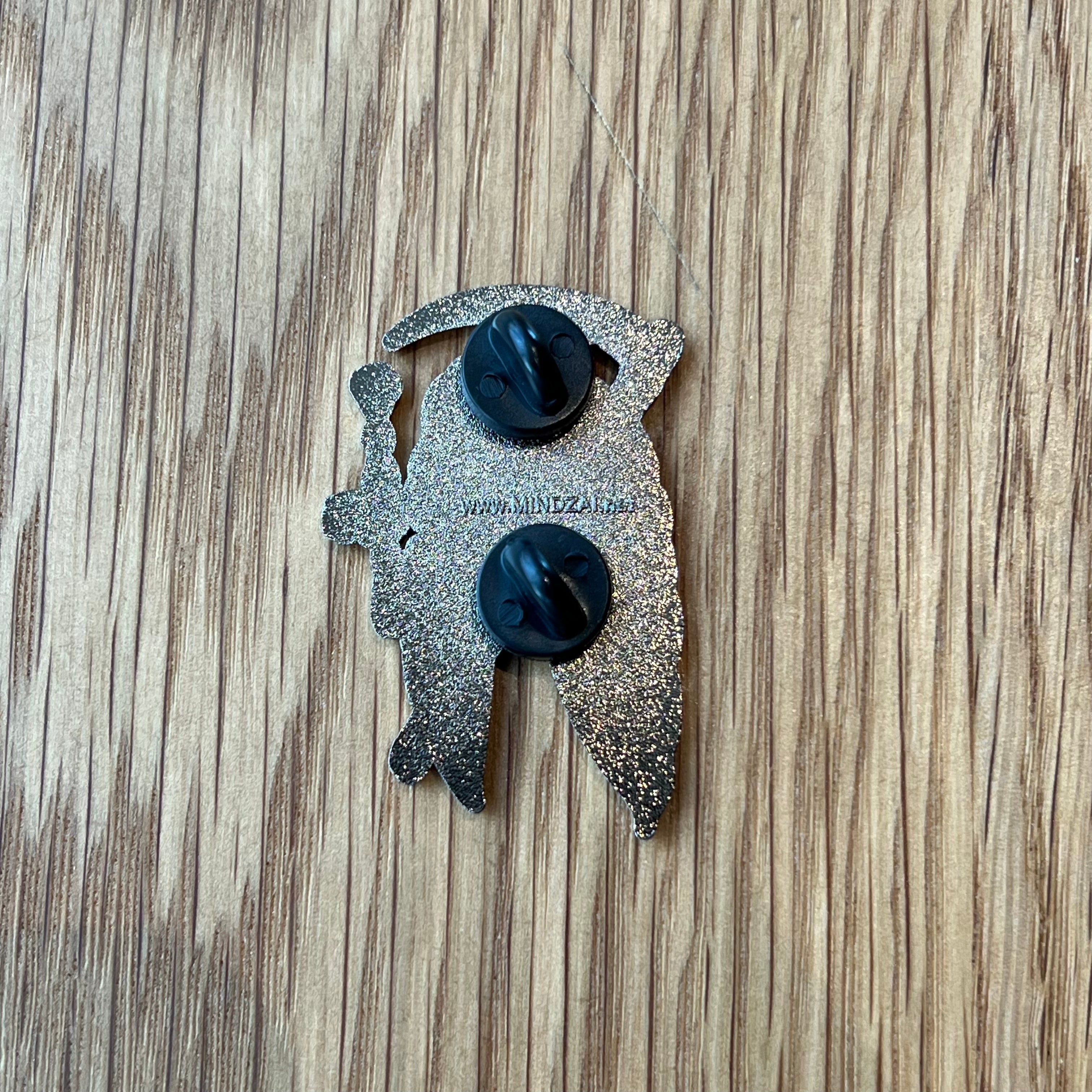 Close-up of Smokin’ Reaper Pin showing skull design and smoking detail.