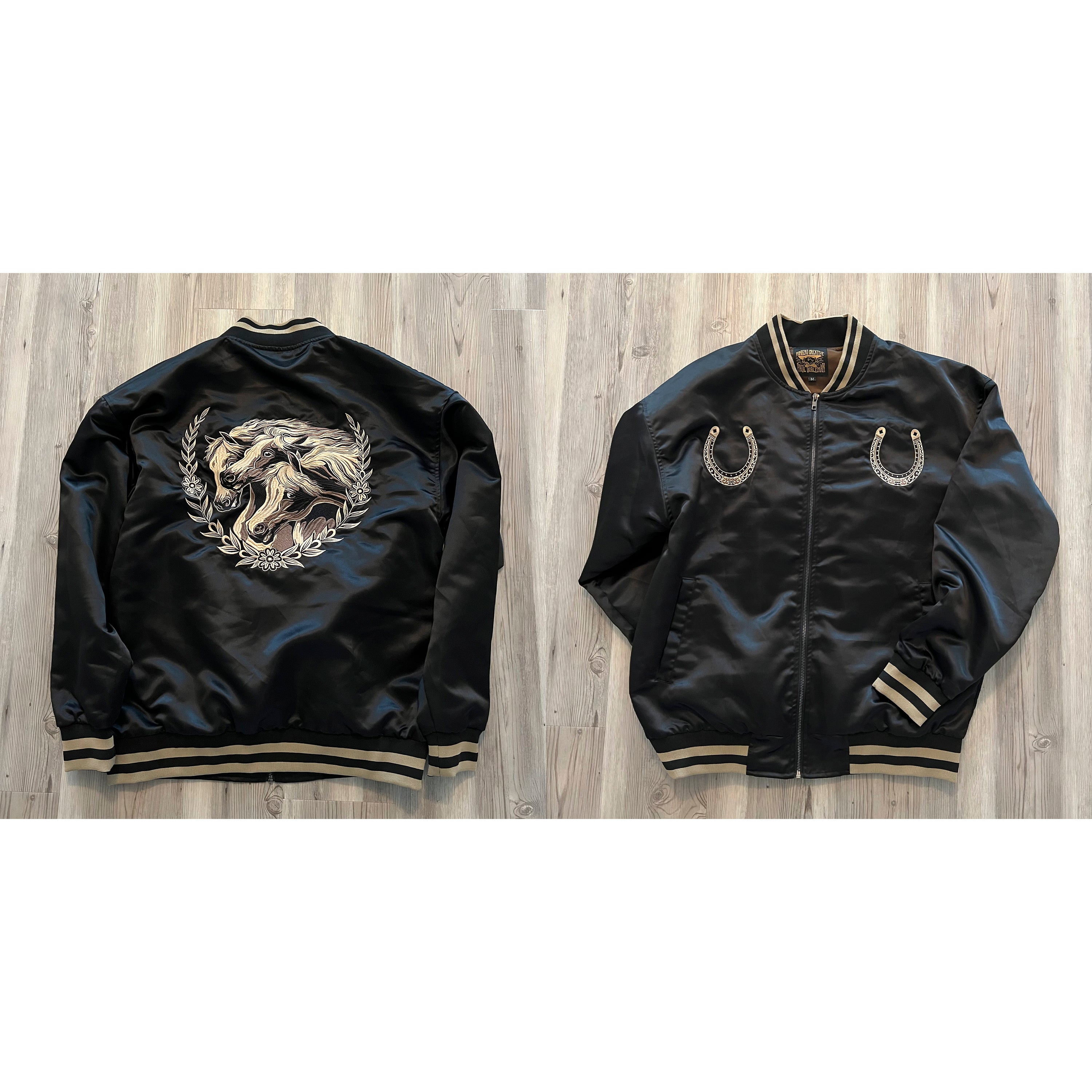 Interior quilted lining of the Year of the Horse satin bomber close-up.