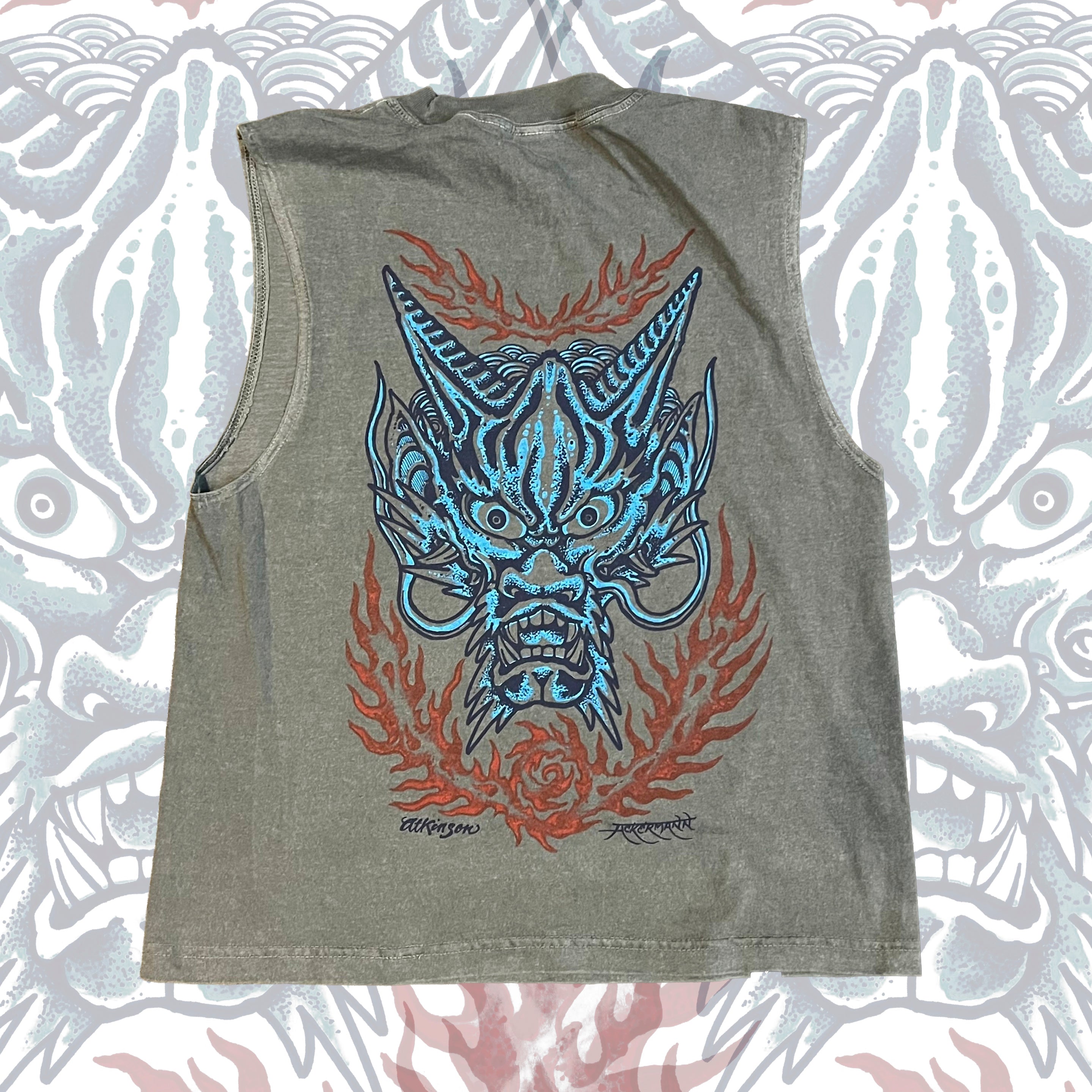 Sleeveless shirt with a dragon design on a patterned background