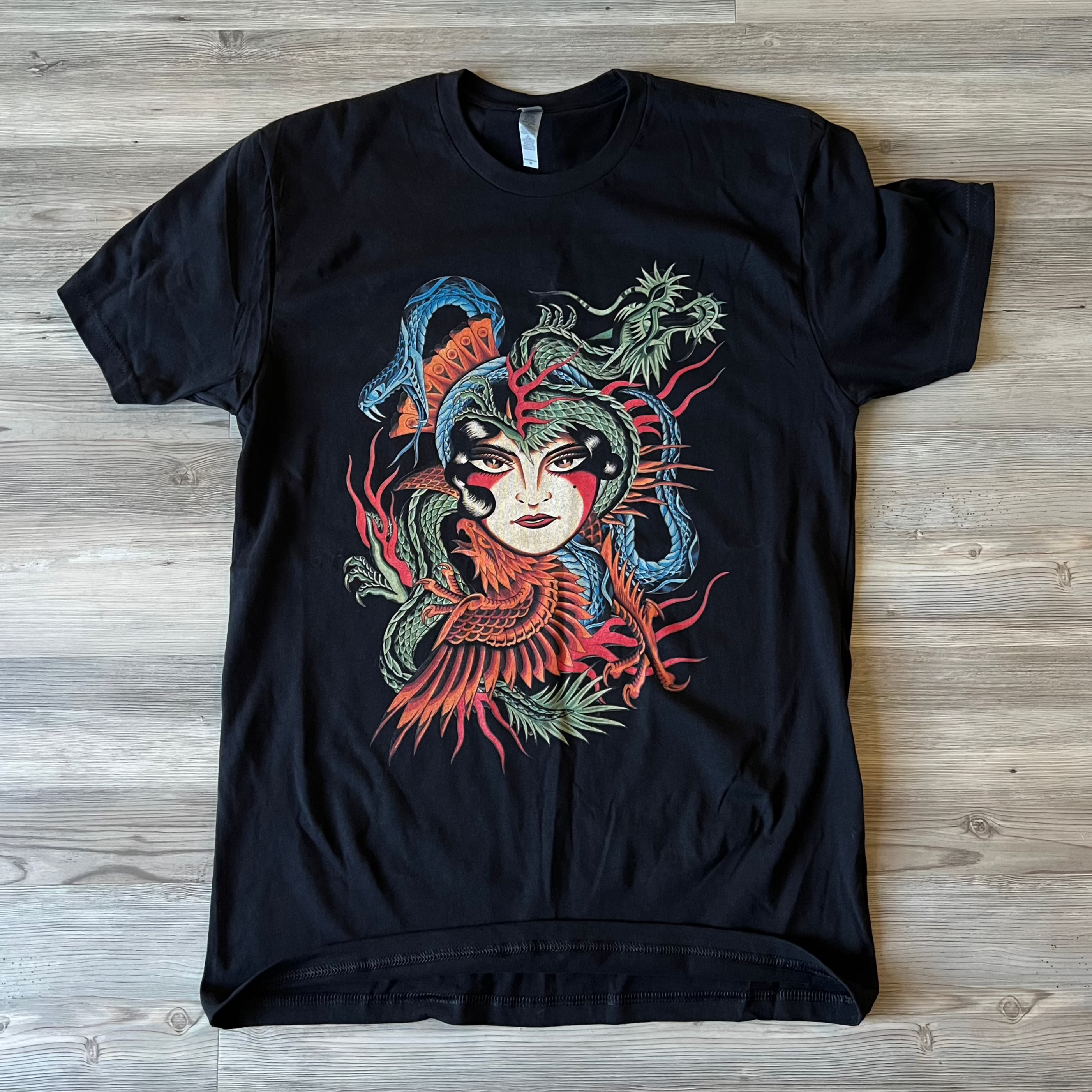 Baroness T-Shirt displayed flat – black shirt with detailed tattoo-style artwork.