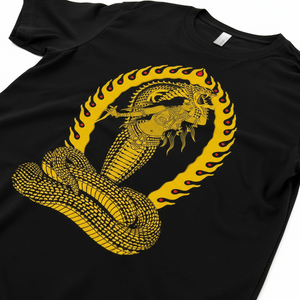 Detail shot of serpent illustration on the Snake Charmer Tee.
