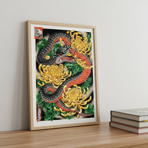 Framed Ryan Ussher Snake & Chrysanthemums Tattoo Art Print Displayed on Table